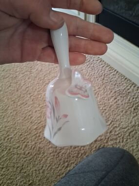 White Porcelain Decorative Bell with Pink Floral Accents